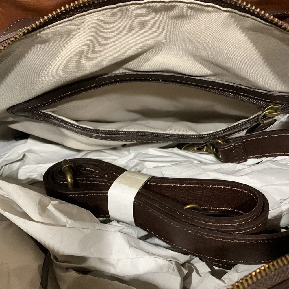 In Pell leather Duffel bag. Color: Brown, Made in Italy